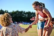 9 July 2025; Megan Keith of Great Britain, right, is presented with her gold medal by Olympian Sonia O'Sullivan after winning the PJ Hegarty Women's 3000m during the Cork City Sports meet at MTU Arena in Cork. Photo by Sam Barnes/Sportsfile