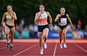 9 July 2025; Cecilia Tamayo-Garza of Mexico, centre, on her way to winning the Bridgewater Construction Women's 200m, alongside Phil Healy of Ireland, right, and Rachel McCann of Ireland during the Cork City Sports meet at MTU Arena in Cork. Photo by Sam Barnes/Sportsfile