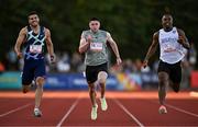 9 July 2025; Colin Doyle of Ireland, centre, alongside, Adam Gemili of Great Britain, left, and Joseph Ayoade of Australia, right, compete in the CETB Men's 200m Race during the Cork City Sports meet at MTU Arena in Cork. Photo by Sam Barnes/Sportsfile