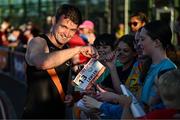 9 July 2025; Marcus Lawler of Ireland gives his race number to a supporter after competing in the CETB Men's 200m Race during the Cork City Sports meet at MTU Arena in Cork. Photo by Sam Barnes/Sportsfile
