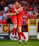 9 July 2025; Sean Boyd, right, and JJ Lunney of Shelbourne celebrate after their side scores their first goal, scored by Mipo Odubeko, not pictured, during the UEFA Champions League First Qualifying Round first leg match between Shelbourne and Linfield at Tolka Park in Dublin. Photo by Seb Daly/Sportsfile