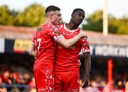 9 July 2025; Mipo Odubeko of Shelbourne, right, celebrates with teammate Daniel Kelly after scoring their side's first goal during the UEFA Champions League First Qualifying Round first leg match between Shelbourne and Linfield at Tolka Park in Dublin. Photo by Ben McShane/Sportsfile