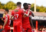 9 July 2025; Mipo Odubeko of Shelbourne, centre, celebrates with teammates Daniel Kelly, left, and Kameron Ledwidge after scoring their side's first goal during the UEFA Champions League First Qualifying Round first leg match between Shelbourne and Linfield at Tolka Park in Dublin. Photo by Ben McShane/Sportsfile