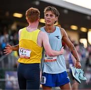 9 July 2025; Marco Langon of USA, right, hugs Lughaidh Mallon of Ireland after winning the Cork City Council Men's Mile during the Cork City Sports meet at MTU Arena in Cork. Photo by Sam Barnes/Sportsfile