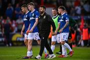 9 July 2025; Linfield manager David Healy consoles Matthew Orr after the UEFA Champions League First Qualifying Round first leg match between Shelbourne and Linfield at Tolka Park in Dublin. Photo by Ben McShane/Sportsfile