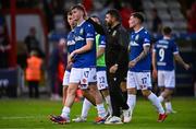 9 July 2025; Linfield manager David Healy consoles Matthew Orr after the UEFA Champions League First Qualifying Round first leg match between Shelbourne and Linfield at Tolka Park in Dublin. Photo by Ben McShane/Sportsfile