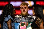 9 July 2025; Cherneka Johnson, right, and Shurretta Metcalf with Jake Paul, co-Founder of Most Valuable Promotions, during a press conference, held at The Theater at Madison Square Garden in New York, USA, ahead of their undisputed bantamweight championship fight on July 11th at Madison Square Garden in New York. Photo by Stephen McCarthy/Sportsfile