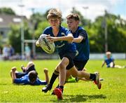10 July 2025; Johnny Neary, left, in action during a Bank of Ireland Leinster Rugby Summer Camp at Navan RFC in Navan, Meath. Photo by Sam Barnes/Sportsfile
