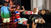 10 July 2025; Amanda Serrano with Nakisa Bidarian, co-Founder of Most Valuable Promotions, during the official commission weigh-in, held at the Kimpton Eventi Hotel in New York, USA, ahead of her undisputed super lightweight championship fight with Katie Taylor on July 11th at Madison Square Garden in New York. Photo by Stephen McCarthy/Sportsfile