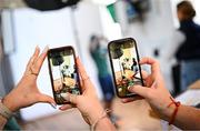 10 July 2025; Attendees photograph the photoshoot during the Team Ireland 2025 World University Games Announcement at Technological University Dublin, Grangegorman in Dublin. Photo by Seb Daly/Sportsfile