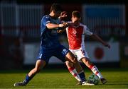 10 July 2025; Brandon Kavanagh of St Patrick's Athletic is tackled by Nikola Doric of FC Hegelmann during the UEFA Conference League First Qualifying Round first leg match between St Patrick's Athletic and FC Hegelmann at Richmond Park in Dublin. Photo by Ben McShane/Sportsfile