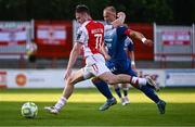 10 July 2025; Jay McClelland of St Patrick's Athletic in action against Klaudijus Upstas of FC Hegelmann during the UEFA Conference League First Qualifying Round first leg match between St Patrick's Athletic and FC Hegelmann at Richmond Park in Dublin. Photo by Ben McShane/Sportsfile