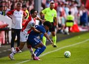 10 July 2025; Zach Elbouzedi of St Patrick's Athletic in action against Carlos Duke of FC Hegelmann during the UEFA Conference League First Qualifying Round first leg match between St Patrick's Athletic and FC Hegelmann at Richmond Park in Dublin. Photo by Ben McShane/Sportsfile