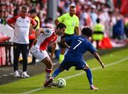 10 July 2025; Zach Elbouzedi of St Patrick's Athletic in action against Carlos Duke of FC Hegelmann during the UEFA Conference League First Qualifying Round first leg match between St Patrick's Athletic and FC Hegelmann at Richmond Park in Dublin. Photo by Ben McShane/Sportsfile