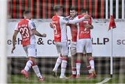 10 July 2025; Aidan Keena of St Patrick's Athletic celebrates with teammates, from left, Ryan McLaughlin, Chris Forrester and Zach Elbouzedi, after scoring their side's first goal during the UEFA Conference League First Qualifying Round first leg match between St Patrick's Athletic and FC Hegelmann at Richmond Park in Dublin. Photo by Ben McShane/Sportsfile