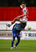 10 July 2025; Mason Melia of St Patrick's Athletic in action against Abdoul Samad Harouna of FC Hegelmann during the UEFA Conference League First Qualifying Round first leg match between St Patrick's Athletic and FC Hegelmann at Richmond Park in Dublin. Photo by Ben McShane/Sportsfile
