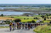 11 July 2025; A general view of the peloton during Stage 4 of 2025 Junior Tour of Ireland from Ennis to Kilfenora. Photo by Stephen McMahon/Sportsfile