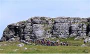 11 July 2025; A general view of the peloton during Stage 4 of 2025 Junior Tour of Ireland from Ennis to Kilfenora. Photo by Stephen McMahon/Sportsfile