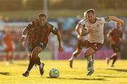 11 July 2025; Douglas James Taylor of Bohemians in action against Greg Cunningham of Galway United during the SSE Airtricity Men's Premier Division match between Bohemians and Galway United at Dalymount Park in Dublin. Photo by Thomas Flinkow/Sportsfile