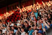 11 July 2025; Bohemians supporters celebrate their side's third goal, scored by James Clarke, during the SSE Airtricity Men's Premier Division match between Bohemians and Galway United at Dalymount Park in Dublin. Photo by Thomas Flinkow/Sportsfile