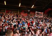 11 July 2025; Bohemians supporters celebrate after their side's win in the SSE Airtricity Men's Premier Division match between Bohemians and Galway United at Dalymount Park in Dublin. Photo by Thomas Flinkow/Sportsfile
