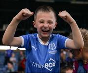 11 July 2025; A Waterford supporter celebrates after the SSE Airtricity Men's Premier Division match between Waterford and Cork City at the Regional Sports Centre in Waterford. Photo by Michael P Ryan/Sportsfile