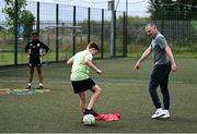 14 July 2025; Republic of Ireland U21's head coach Jim Crawford coaching Conall Geoghegan at a MiWadi FAI Football Camp at Tullamore Town FC in Tullamore, Offaly. Photo by Piaras Ó Mídheach/Sportsfile