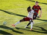 11 July 2025; Jeannot Esua of Galway United in action against Ross Tierney of Bohemians during the SSE Airtricity Men's Premier Division match between Bohemians and Galway United at Dalymount Park in Dublin. Photo by Thomas Flinkow/Sportsfile