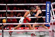 11 July 2025; Katie Taylor, right, and Amanda Serrano during their undisputed super lightweight championship fight at Madison Square Garden in New York, USA. Photo by Stephen McCarthy/Sportsfile