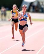 12 July 2025; Katie Doherty of Ratoath A.C., Dublin, competes in the Girls U19 200m during day three of the Juvenile Track and Field Championships at Tullamore Harriers Athletics Club in Tullamore, Offaly. Photo by Ben McShane/Sportsfile