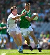 12 July 2025; Daniel Neville of Limerick in action against James McGrath of Kildare during the Tailteann Cup final match between Kildare and Limerick at Croke Park in Dublin. Photo by Ray McManus/Sportsfile