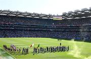 12 July 2025; Kerry and Tyrone players parade before the GAA Football All-Ireland Senior Championship semi-final match between Kerry and Tyrone at Croke Park in Dublin. Photo by Seb Daly/Sportsfile