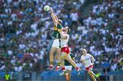 12 July 2025; Seán O'Brien of Kerry in action against Michael O'Neill of Tyrone during the GAA Football All-Ireland Senior Championship semi-final match between Kerry and Tyrone at Croke Park in Dublin. Photo by Ray McManus/Sportsfile