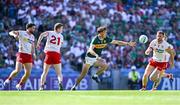 12 July 2025; David Clifford of Kerry gets to the ball ahead of Brian Kennedy of Tyrone, 8, during the GAA Football All-Ireland Senior Championship semi-final match between Kerry and Tyrone at Croke Park in Dublin. Photo by Piaras Ó Mídheach/Sportsfile