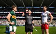 12 July 2025; Referee Joe McQuillan with Kerry captain Gavin White and Tyrone captain Brian Kennedy before the GAA Football All-Ireland Senior Championship semi-final match between Kerry and Tyrone at Croke Park in Dublin. Photo by Seb Daly/Sportsfile