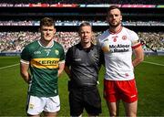 12 July 2025; Referee Joe McQuillan with Kerry captain Gavin White and Tyrone captain Brian Kennedy before the GAA Football All-Ireland Senior Championship semi-final match between Kerry and Tyrone at Croke Park in Dublin. Photo by Seb Daly/Sportsfile