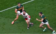 12 July 2025; Peter Teague of Tyrone in action against Joe O'Connor, left, and Graham O'Sullivan of Kerry during the GAA Football All-Ireland Senior Championship semi-final match between Kerry and Tyrone at Croke Park in Dublin. Photo by Ramsey Cardy/Sportsfile
