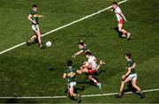 12 July 2025; Darragh Canavan of Tyrone in action against Kerry players, from left, Brian Ó Beaglaoich, Paul Murphy and Dylan Casey during the GAA Football All-Ireland Senior Championship semi-final match between Kerry and Tyrone at Croke Park in Dublin. Photo by Ramsey Cardy/Sportsfile