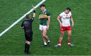 12 July 2025; Referee Joe McQuillan shows a yellow card to David Clifford of Kerry and Michael McKernan of Tyrone during the GAA Football All-Ireland Senior Championship semi-final match between Kerry and Tyrone at Croke Park in Dublin. Photo by Ramsey Cardy/Sportsfile