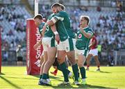 12 July 2025; Hugh Gavin of Ireland is congratulated by team mates Stuart McCloskey and Craig Casey, right after scoring their second try during the International Rugby Test match between Portugal and Ireland at Estádio Nacional do Jamor in Lisbon, Portugal. Photo by David Fitzgerald/Sportsfile