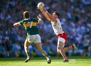 12 July 2025; Peter Teague of Tyrone in action against Gavin White of Kerry during the GAA Football All-Ireland Senior Championship semi-final match between Kerry and Tyrone at Croke Park in Dublin. Photo by Piaras Ó Mídheach/Sportsfile