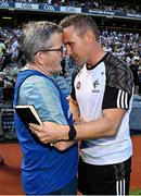 12 July 2025; Kildare manager Brian Flanagan, right, and Limerick manager Jimmy Lee shake hands after the Tailteann Cup final match between Kildare and Limerick at Croke Park in Dublin. Photo by Seb Daly/Sportsfile