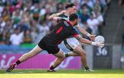 12 July 2025; Paudie Clifford of Kerry in action against Tyrone goalkeeper Niall Morgan during the GAA Football All-Ireland Senior Championship semi-final match between Kerry and Tyrone at Croke Park in Dublin. Photo by Ray McManus/Sportsfile