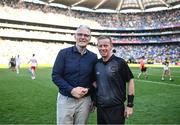 12 July 2025; Referee Joe McQuillan shakes hands with Uachtarán Chumann Lúthchleas Gael Jarlath Burns after officiating his last intercounty match at the GAA Football All-Ireland Senior Championship semi-final match between Kerry and Tyrone at Croke Park in Dublin. Photo by Piaras Ó Mídheach/Sportsfile