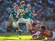 12 July 2025; Tommy O'Brien of Ireland on his way to scoring his side's fifth try despite the attempted tackles from Simao Bento of Portugal during the International Rugby Test match between Portugal and Ireland at Estádio Nacional do Jamor in Lisbon, Portugal. Photo by David Fitzgerald/Sportsfile