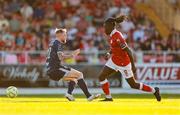 12 July 2025; Wilson Waweru of Sligo Rovers in action against Carl Winchester of Derry City during the SSE Airtricity Men's Premier Division match between Sligo Rovers and Derry City at The Showgrounds in Sligo. Photo by Thomas Flinkow/Sportsfile