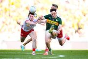 12 July 2025; Paudie Clifford of Kerry in action against Tyrone players Eoin McElholm, left, and Mattie Donnelly during the GAA Football All-Ireland Senior Championship semi-final match between Kerry and Tyrone at Croke Park in Dublin. Photo by Seb Daly/Sportsfile