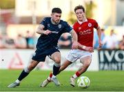 12 July 2025; Adam O'Reilly of Derry City in action against William Fitzgerald of Sligo Rovers during the SSE Airtricity Men's Premier Division match between Sligo Rovers and Derry City at The Showgrounds in Sligo. Photo by Thomas Flinkow/Sportsfile