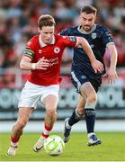 12 July 2025; William Fitzgerald of Sligo Rovers in action against Michael Duffy of Derry City during the SSE Airtricity Men's Premier Division match between Sligo Rovers and Derry City at The Showgrounds in Sligo. Photo by Thomas Flinkow/Sportsfile