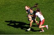 12 July 2025; Ava Deacon, Kildavin National School, Kildavin, Carlow, representing Kerry, in action against Layla Grouse, St Vincent's Girls School, North William Street, Dublin; left, and Megan McGowan, St Martin's Primary School, Garrison, Fermanagh, representing Tyrone, during the GAA Football All-Ireland Senior Championship semi-final match between Kerry and Tyrone at Croke Park in Dublin. Photo by Ramsey Cardy/Sportsfile